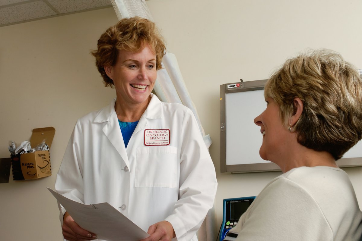 A doctor talking with a patient